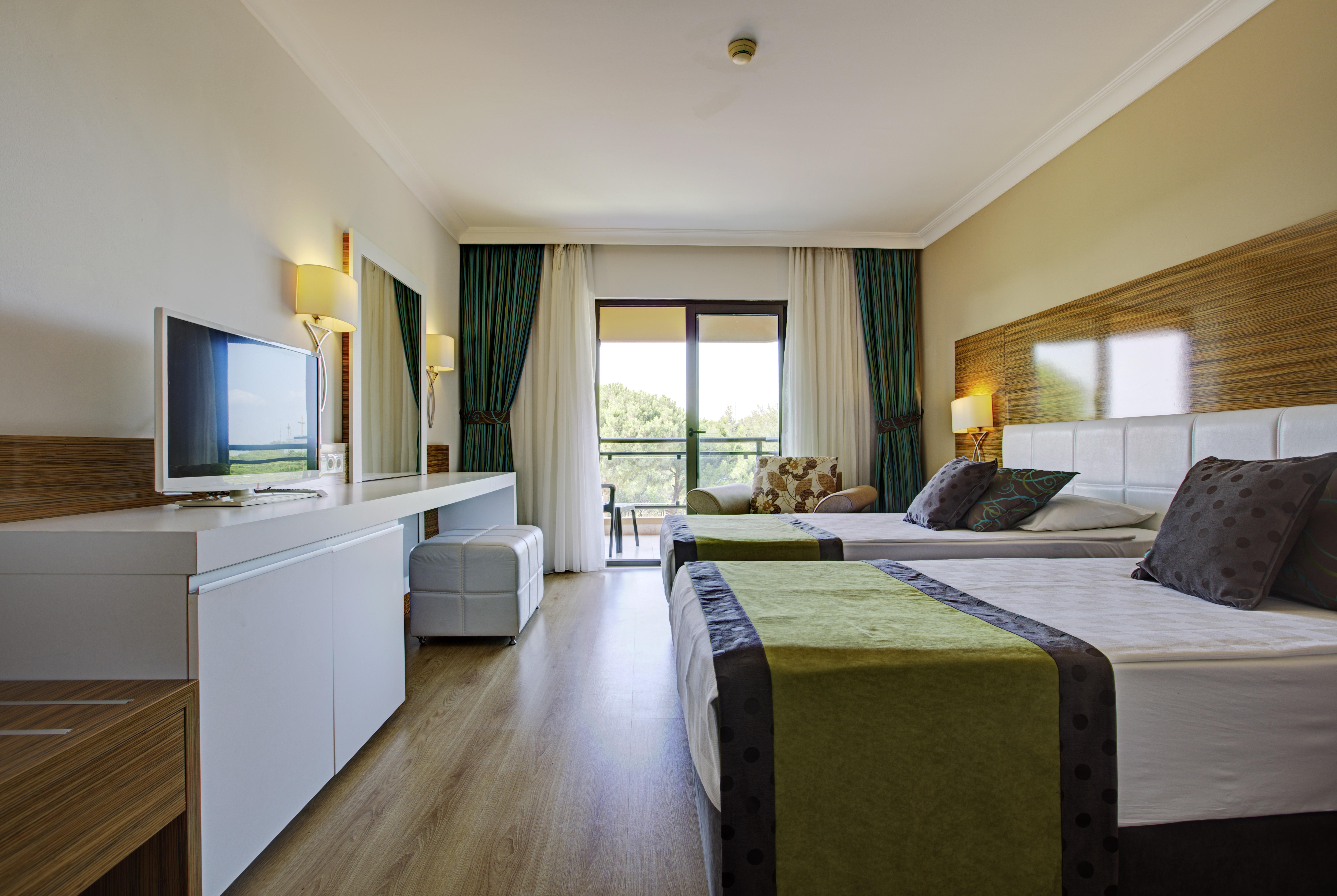 อควาเวิลด์ เบเล็ก Hotel อันตัลยา ภายนอก รูปภาพ A room at the hotel